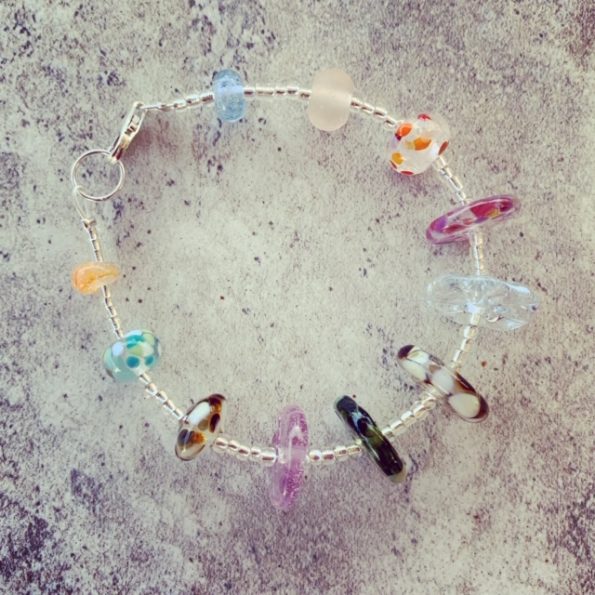 Recycled glass bracelet | beads made from a mix of recycled glass objects