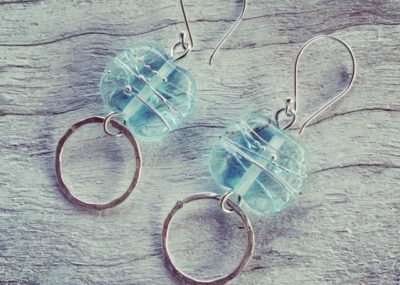Handmade recycled glass bead earrings, made from a banrock Station wine bottle