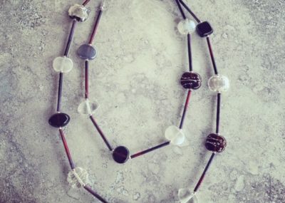 Long, stylish and elegant Gin and Tonic necklace, featuring beads made from a Hendricks Gin and Fever-Tree tonic bottle.