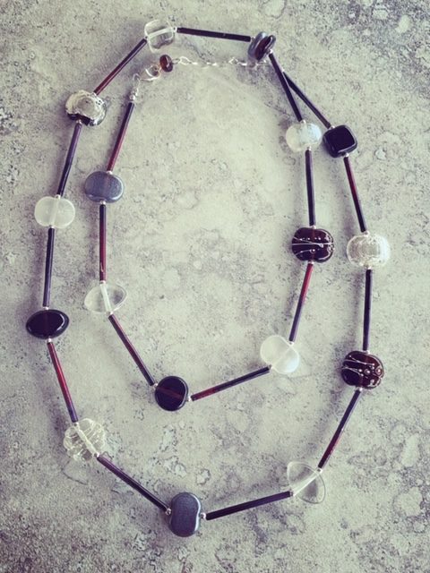 Long, stylish and elegant Gin and Tonic necklace, featuring beads made from a Hendricks Gin and Fever-Tree tonic bottle.