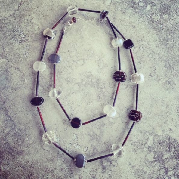 Long, stylish and elegant Gin and Tonic necklace, featuring beads made from a Hendricks Gin and Fever-Tree tonic bottle.