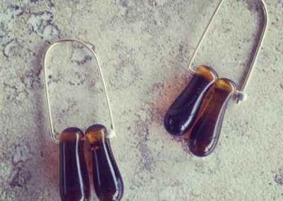 Stunning recycled glass earrings, featuring beads made from a Hendricks Gin bottle