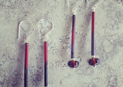 Long earrings, featuring beads made from gin and tonic bottles