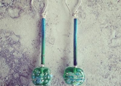 Long earrings made from a Tanqueray Gin bottle