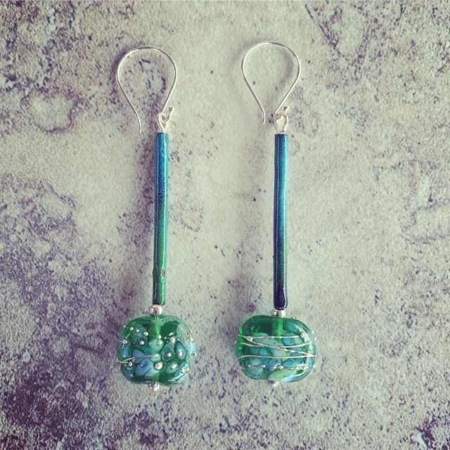 Long earrings made from a Tanqueray Gin bottle
