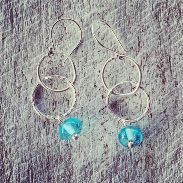 Silver earrings featuring a Bombay Sapphire Gin bottle bead