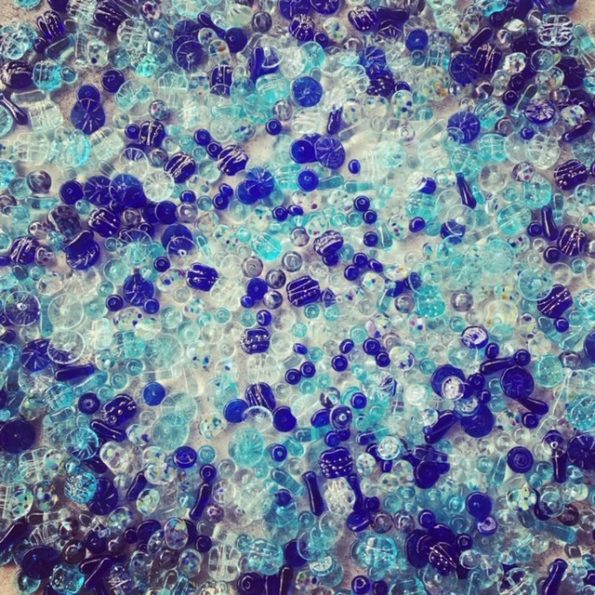 Recycled glass beads made from various blue glass objects