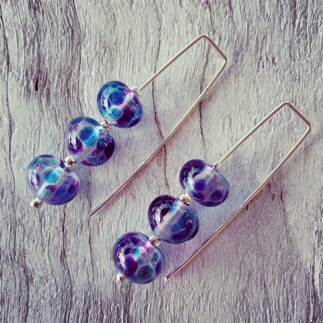 Long dark blue glass earrings made from a wine bottle