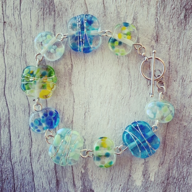 Blue and Green bracelet made from a wine bottle