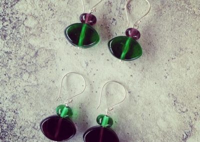 Green and Purple recycled glass earrings made from gin bottles