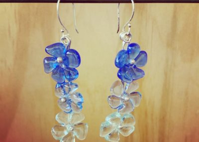 Really long blue glass flower earrings