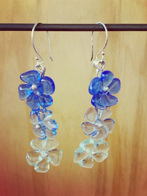 Really long blue glass flower earrings