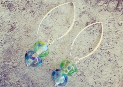 Blue and green recycled glass earrings from a wine bottle