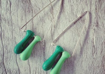 Long green triangle earrings