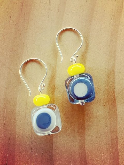 Grey earrings with a pop of yellow