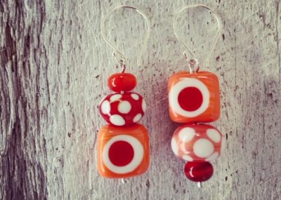 red coral asymmetrical glass bead earrings