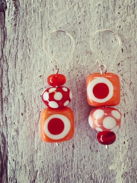 red coral asymmetrical glass bead earrings