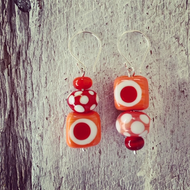 red coral asymmetrical glass bead earrings