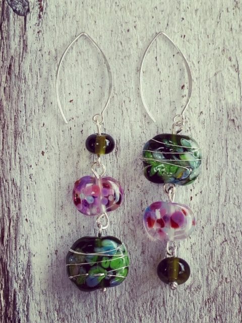 Day 71. Just out of curiosity, do you prefer the way the earring on the left goes from smallest to largest bead? Or do you prefer the earring on the right that goes from largest to smallest bead? I must confess, my plan for the earrings was the earring on the left, but when I tried it the other way, I preferred the one on the right! It’s one of the reasons I love this challenge, because it’s gets designs out of my head and into reality, where things can sometimes end up different from what I had planned. These earrings feature a variety of recycled glass beads made from wine and champagne bottles.