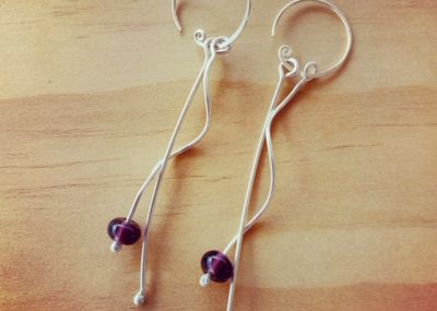 Long, dangly, curly silver earrings with Hendrick Gin - Limited Release bead