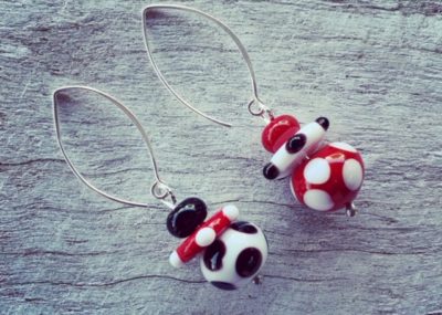 Red, black, white mismatched earrings