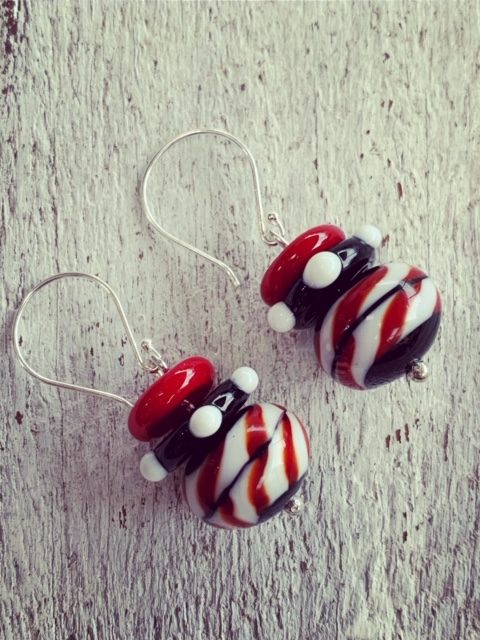 red, black and white earrings