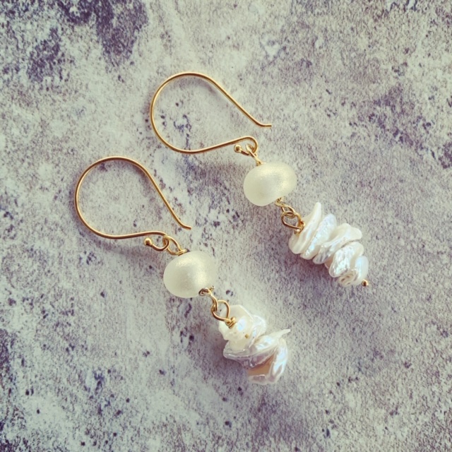 Gold wine bottle and pearl earrings