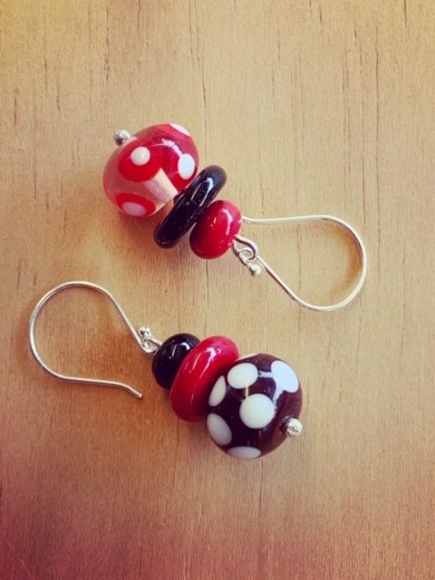 Red, black and white mismatched earrings